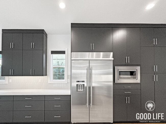 Building Photo - Luxury 5-Bedroom Home with Walk-In Closets, Modern Kitchen & Community Pool