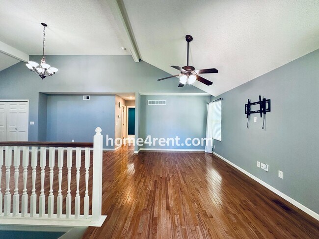 Building Photo - Overland Park Raised Ranch, Primary Suite on the Main Level, Updated Kitchen and Fenced Yard!