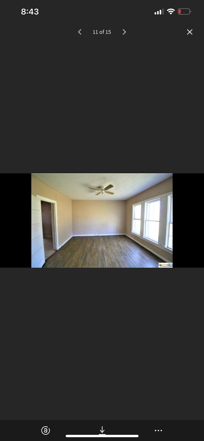 Old photo! Has all new floors, appliances and AC unit! Very cozy now! - 307 Crockett St