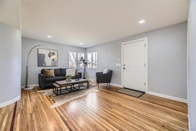 Building Photo - "Charming 3-Bed SFH Denver Gem with Gleaming Hardwood Floors"