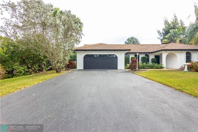 Building Photo - 4490 SW 105th Ave