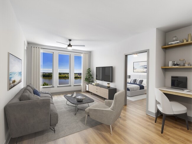 Disfrute de la comodidad de trabajar desde casa sin esfuerzo en Modera Riverview, donde casas seleccionadas cuentan con escritorios y estantes empotrados. - Modera Riverview