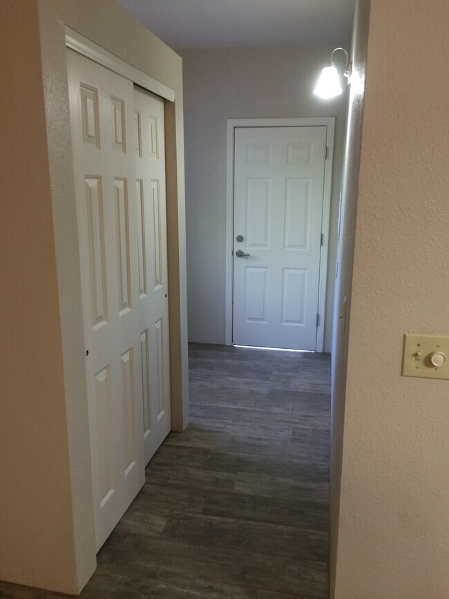 Front door, storage closet. - 390 Fairway Oaks Dr