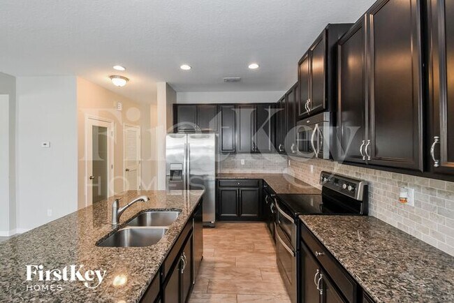 Building Photo - 7031 Azalea Grove Dr