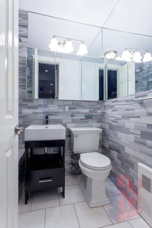 Photo - 219 E 28th St Apartment