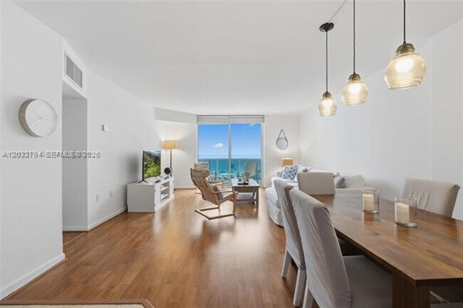 Building Photo - 10275 Collins Ave