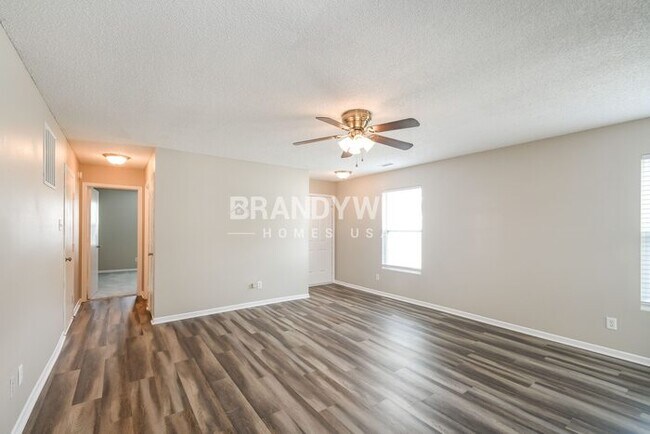 Building Photo - Step into Your New Home! Tour & Apply Now!...