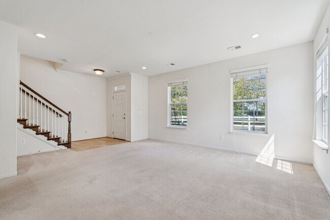 Building Photo - This beautifully maintained end-unit brick...