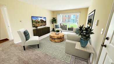 A cheerful setting for gathering in your luxe living room with a large door wall leading to a private patio or balcony. Life is good at this Royal Oak apartment community in such a nice neighborhood. - Briarwood Park Apartments