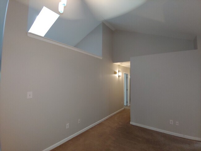Living room with vaulted ceilings - 808 Clayton Rd