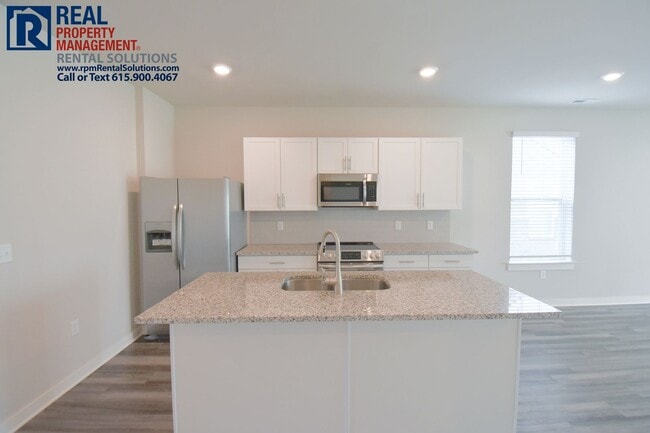 Building Photo - Beautiful 3 bedroom+loft townhome with an attached garage! Triple Blackman schools