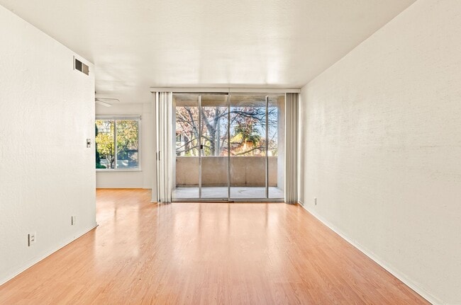 Building Photo - Utilities & Parking Included! Massive 2BD w/ Community Amenities