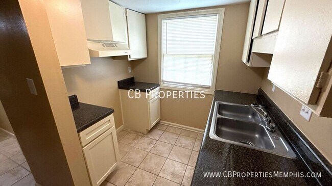 Building Photo - 5203 Flowering Peach Dr