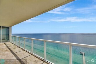 Building Photo - 16699 Collins Ave