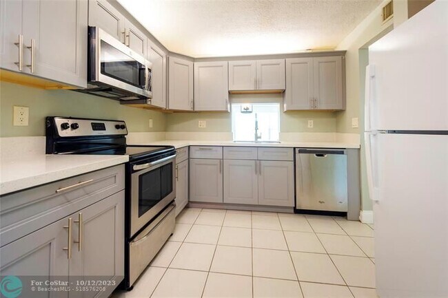 Building Photo - 7410 Woodmont Terrace