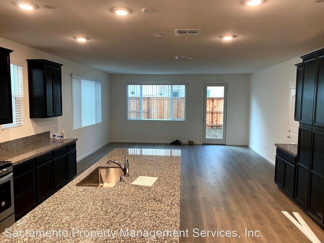 Building Photo - 4 br, 3 bath House - 2458 Buzz Aldrin Way