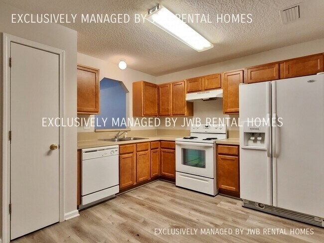 Building Photo - 8467 McGirts Village Ln