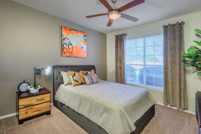 Spacious Bedroom with Ceiling Fan - Montclair Parc Apartments