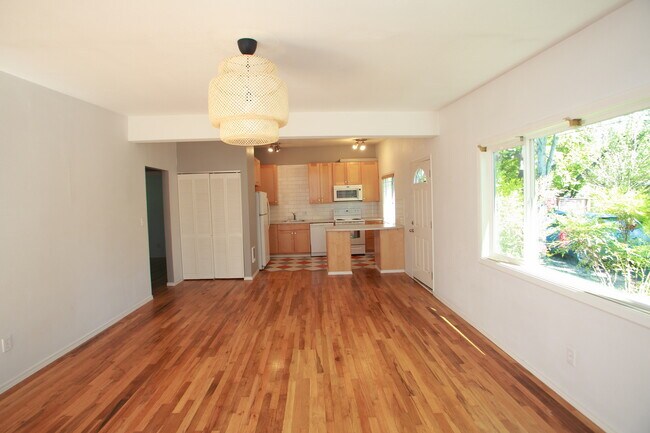Living room looking towards the kitchen and front door - 5427 SE Tibbetts St