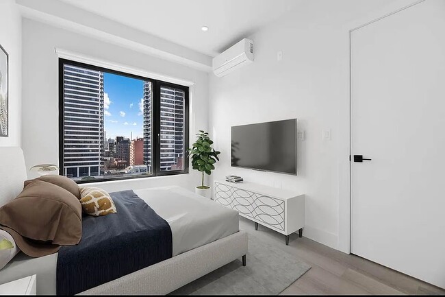 Foto del edificio - 215 E 124th St