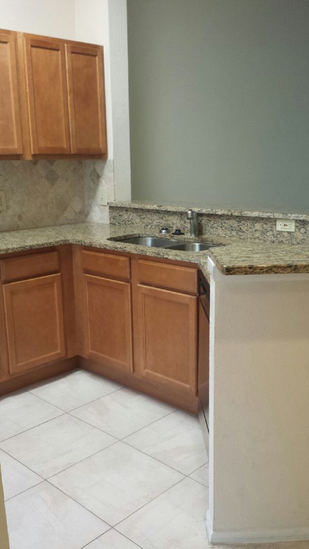 Building Photo - Welcome home to this well-located 2-bedroom, 2-bath second-floor condominium in the Dr. Phillips ...