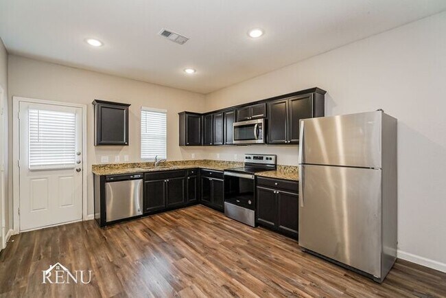 Foto del edificio - 6202 Old Bridge Way