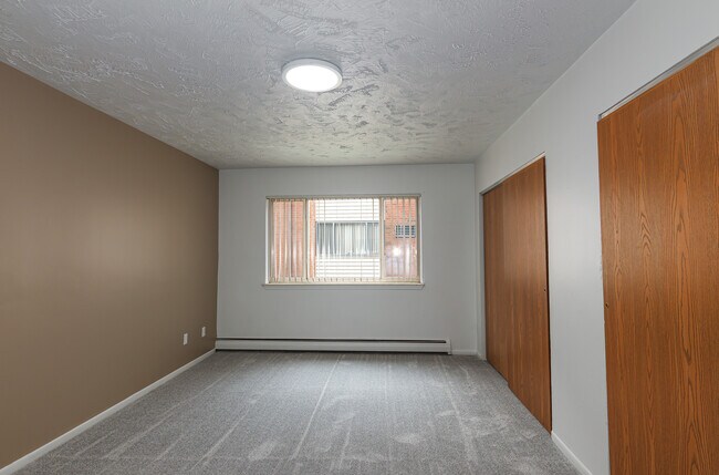 Dormitorio grande - Colonial Place Apartments