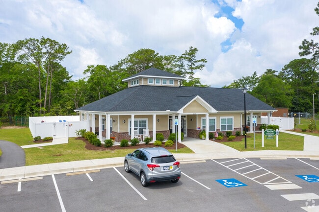 Building Photo - River Oaks Villas