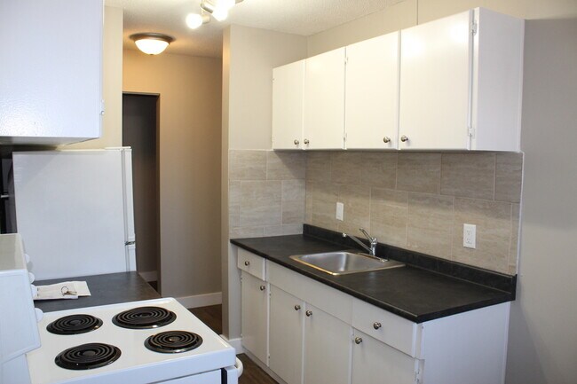 Photo du bâtiment - McCam Apartment 4