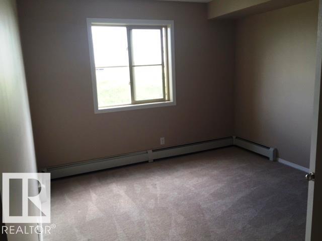 Photo du bâtiment - 12035 22 Ave SW