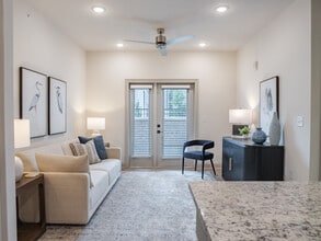 The Perdido: 1BR, 1BA- Living Room - The Flats at Ransley