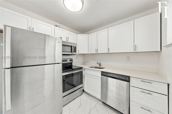 Foto del edificio - 6965 Harding Ave