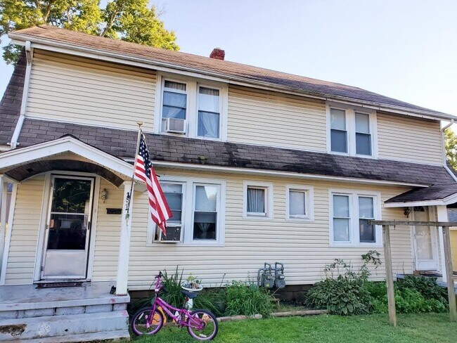 153 is on the right side - 153 W College St