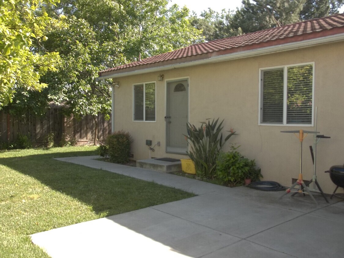 Primary Photo - Detached unit located behind single family...