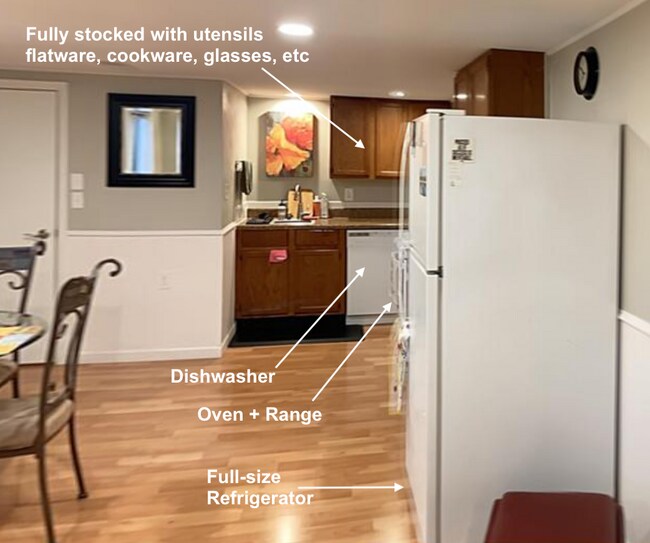 Fully-stocked kitchen with range, dishwasher, full-sized refrigerator. - 450 S 41st St