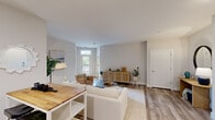 Located at 3688 Brinell St W in Columbus, Ohio, this single-floor, three-bedroom, two-bathroom home offers a well-designed layout that maximizes functionality and comfort. The open-concept kitchen and living area serves as the heart of the home, featuring wood-look flooring, white shaker cabinetry, dark granite countertops, and a full suite of stainless steel appliances including a dishwasher, range, and microwave. The living room receives natural light through a large exterior-facing door and offers ample space for comfortable seating arrangements. The three bedrooms are carpeted and well-proportioned, with the primary bedroom offering generous dimensions and a walk-in closet equipped with wire shelving. Additional bedrooms also feature closet access, providing practical storage throughout. Two full bathrooms serve the home: one includes a tub/shower combination, while the other features a glass-enclosed walk-in shower. Both bathrooms are finished with granite-topped white vanities and wood-look tile flooring, maintaining a cohesive aesthetic. A hallway connects the private areas of the home to the main living spaces. The overall design palette of soft neutrals, clean white trim, and consistent finishes creates a bright, modern, and inviting atmosphere throughout.