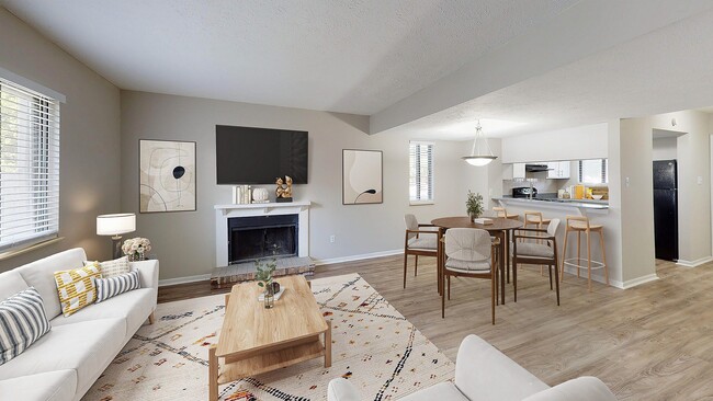 Sala de estar con chimenea - Avery Point Apartments