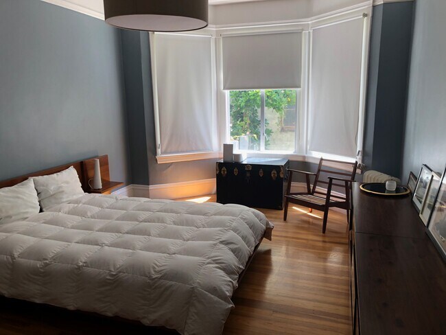 Room 1. Room for queen bed with dressers, desk and more. Blackout shades. Walk-in closet - 1267 Chestnut St