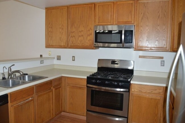 Photo - Spacious Three-Bedroom Two-Story Townhome with Garage and Private Yard