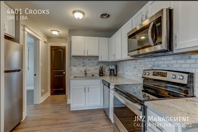 Building Photo - Beautifully Updated Ranch Style Unit In Ro...