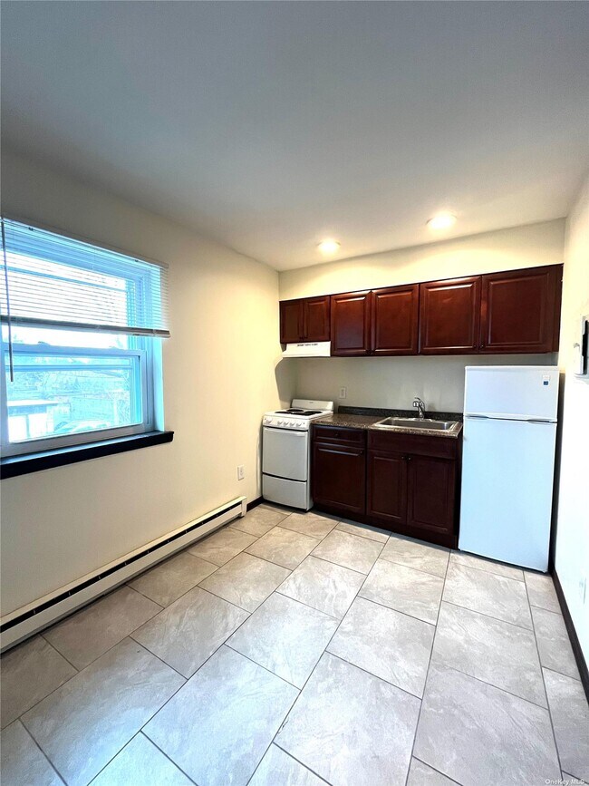 Building Photo - 5000 Hempstead Tpke