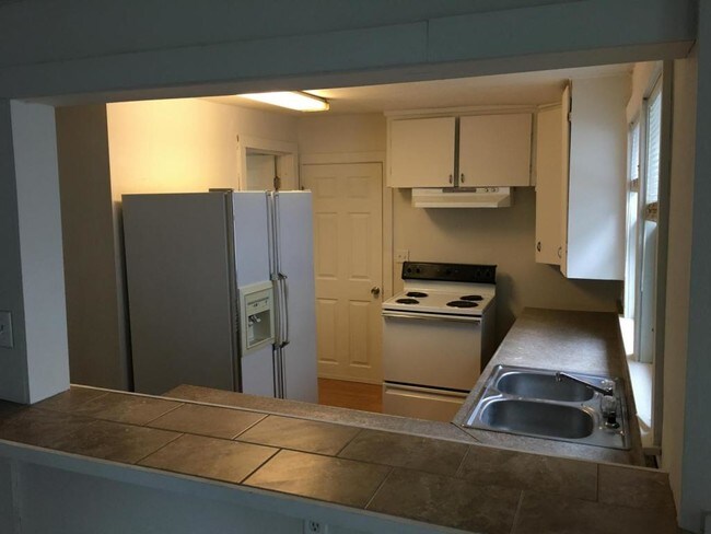 Building Photo - 2124 W Broadway Ave, Unit 1