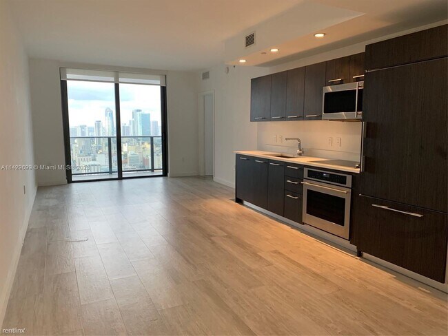 Foto del edificio - 1 br, 1.5 bath Condo - 45 SW 9th St Apt 4009