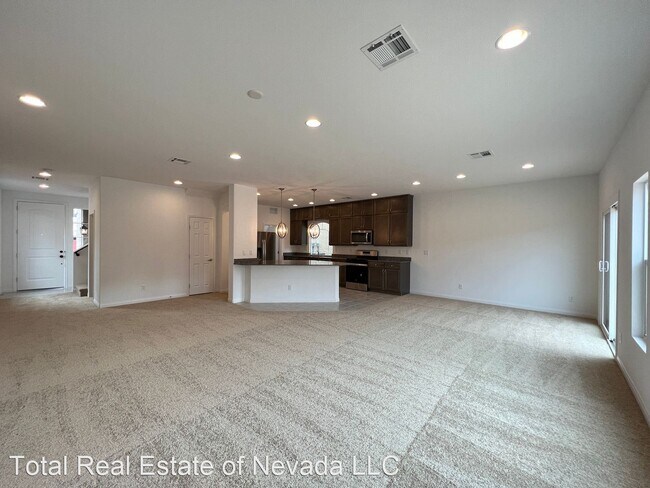 Building Photo - 4 br, 2.5 bath House - 7869 Tyrell Peaks St