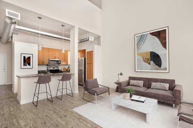 Spacious living rooms designed for comfort and style. - Lofts at 7100
