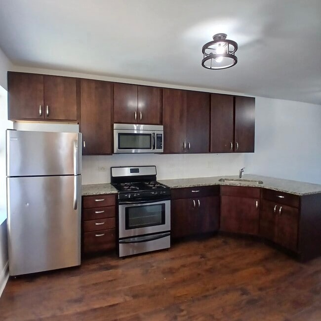 Foto del edificio - 4876 W Armitage Ave