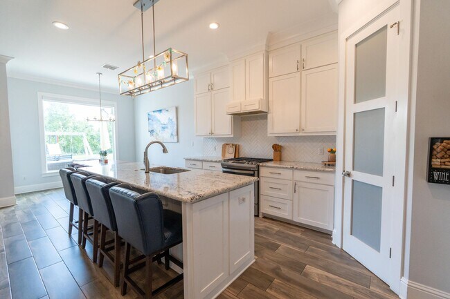 Building Photo - Waterfront Dream in Island Park | 4BR Retreat with Fire Pit, Flex Space & Backyard Oasis