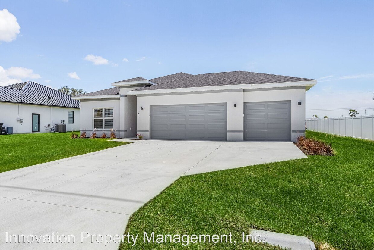 Foto principal - 4 br, 2 bath House - 421 NW 1st Street