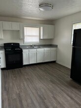 Building Photo - 7015-7017 Manor Dr N