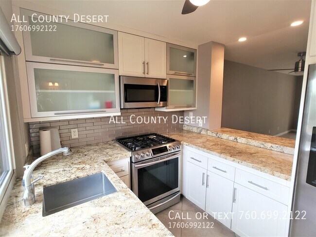 Building Photo - 48822 Desert Flower Dr